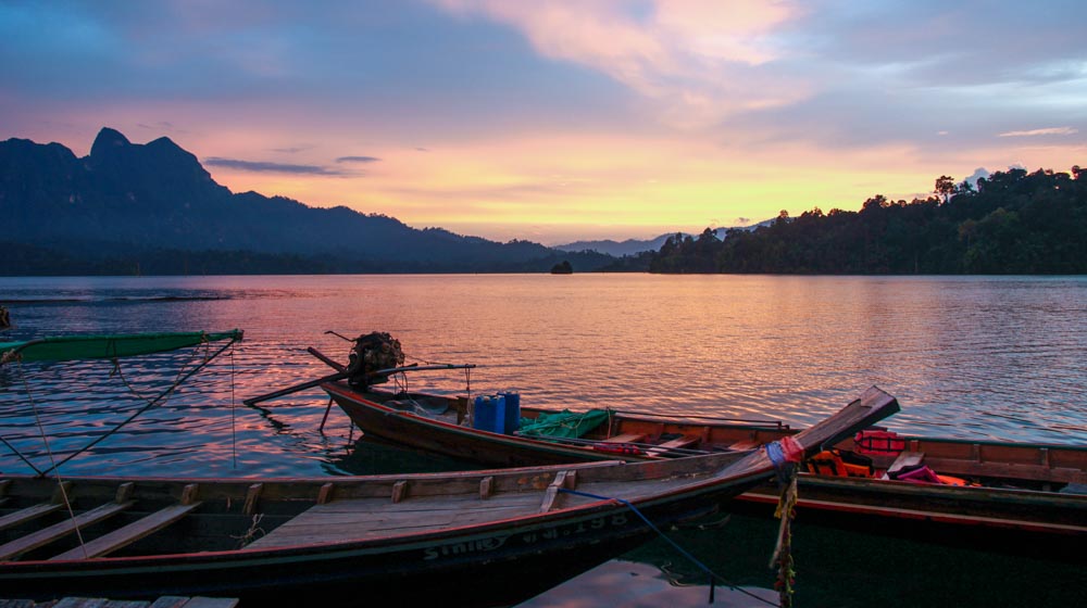 khao sok sunset on boats