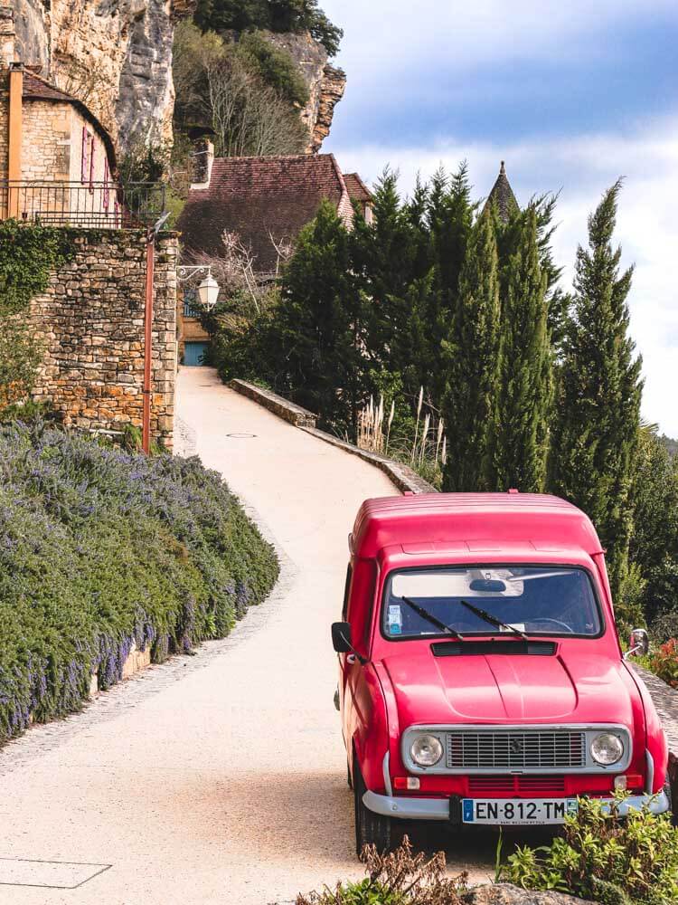 La Roque-Gageac Dordogne Village Red Car in Southwest France,_